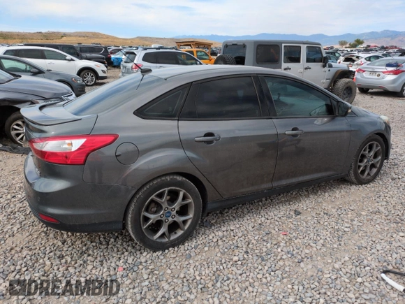 2013 Ford Focus SE with VIN 1FADP3F24DL189897, listed as a Copart auction lot 61970155 with 212,218 mi miles and Salvage title. Bid and sale history available at DreamBid. Image 3.