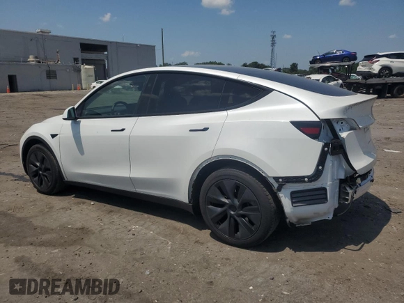 2024 Tesla Model Y с VIN 7SAYGDED3RF182859, выставлен на аукционе Copart как лот 61368825 с пробегом 13 914 миль миль и Списание • Salvage title. История ставок и продаж доступна на DreamBid. Изображение 2.