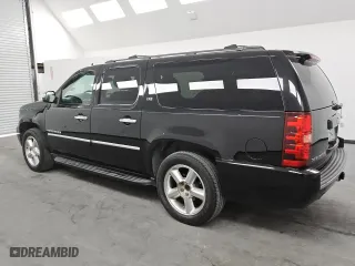 2013 Chevrolet Suburban LTZ with VIN 1GNSKKE79DR371333, listed as a Copart auction lot 74394354 with 165,171 mi miles and Clean Title. Bid and sale history available at carsss.com. Image 2.