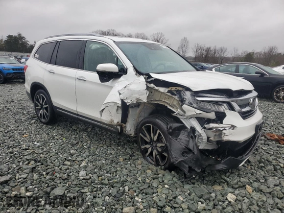 2020 Honda Pilot Touring 8-Passenger with VIN 5FNYF6H95LB053631, listed as a Copart auction lot 47732865 with 67,728 mi miles and Salvage Title. Bid and sale history available at DreamBid. Image 4.