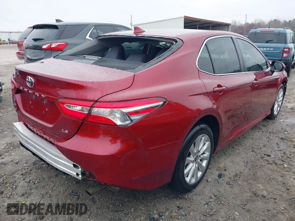 2020 Toyota Camry LE with VIN 4T1C11AK1LU359477, listed as a IAAI auction lot 41800546 with 109,319 mi miles and . Bid and sale history available at DreamBid. Image 4.