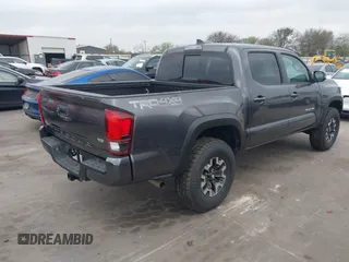 2018 Toyota Tacoma SR with VIN 5TFCZ5AN6JX127774, listed as a IAAI auction lot 41801158 with 28,161 mi miles and . Bid and sale history available at DreamBid. Image 4.