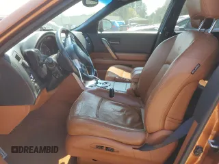 2004 Infiniti FX with VIN JNRAS08W54X224093, listed as a Copart auction lot 54013415 with 195,797 mi miles and Salvage Title. Bid and sale history available at DreamBid. Image 7.