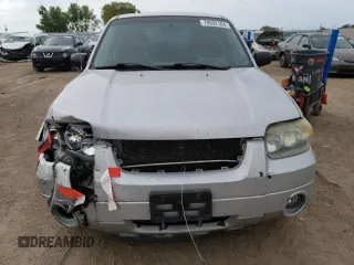 2004 Ford Escape Limited with VIN 1FMCU94184KB62778, listed as a Copart auction lot 70992184 with 165,199 mi miles and Salvage Title. Bid and sale history available at carsss.com. Image 5.
