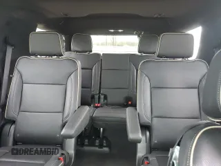 2023 Chevrolet Tahoe Premier with VIN 1GNSKSKD0PR217513, listed as a Copart auction lot 54702845 with 55,424 mi miles and Salvage title. Bid and sale history available at DreamBid. Image 10.