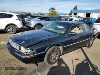 1995 Cadillac Eldorado z VIN 1G6EL12Y1SU623065, wystawiony jako Copart lot #78058414 z przebiegiem 115 060 mil mil oraz Czysty tytuł • Clean title. Historia ofert i sprzedaży dostępna na DreamBid. Obrazek 1.