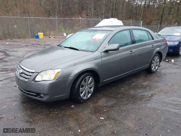 2007 Toyota Avalon XL with VIN 4T1BK36B27U204147, listed as a IAAI auction lot 41585882 with 166,303 mi miles. Bid and sale history available at carsss.com. Image 2.