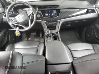 2021 Cadillac XT6 Premium Luxury with VIN 1GYKPDRS3MZ165049, listed as a Copart auction lot 45456145 with 57,112 mi miles and Salvage title. Bid and sale history available at DreamBid. Image 8.
