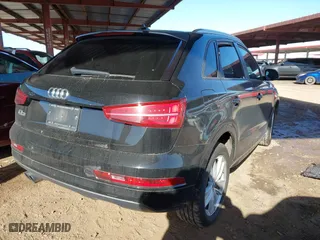 2018 Audi Q3 Premium with VIN WA1BCCFS5JR007740, listed as a IAAI auction lot 41763415 with 73,934 mi miles. Bid and sale history available at carsss.com. Image 4.