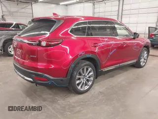 2023 Mazda CX-9 Carbon Edition with VIN JM3TCBDY2P0633133, listed as a IAAI auction lot 41684820 with 23,739 mi miles and . Bid and sale history available at carsss.com. Image 4.