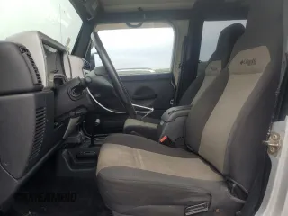 2004 Jeep Wrangler X with VIN 1J4FA39S74P724420, listed as a Copart auction lot 71839944 with 135,742 mi miles and Clean Title. Bid and sale history available at carsss.com. Image 7.