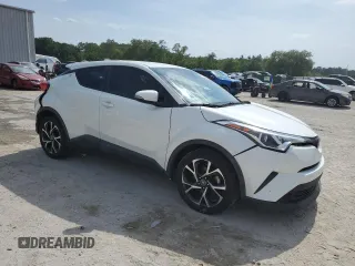 2019 Toyota C-HR XLE z VIN NMTKHMBX5KR079425, wystawiony jako Copart lot #57315345 z przebiegiem 109 441 mil mil oraz Szkoda całkowita • Salvage title. Historia ofert i sprzedaży dostępna na DreamBid. Obrazek 4.