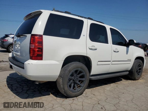 2013 Chevrolet Tahoe LT с VIN 1GNSCBE01DR158327, выставлен на аукционе Copart как лот 61760895 с пробегом 228 070 миль миль и Списание • Salvage title. История ставок и продаж доступна на DreamBid. Изображение 3.