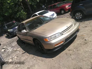 1994 Honda Accord LX with VIN 1HGCD5636RA020200, listed as a IAAI auction lot 40056997 with 212,810 mi miles. Bid and sale history available at carsss.com. Image 1.