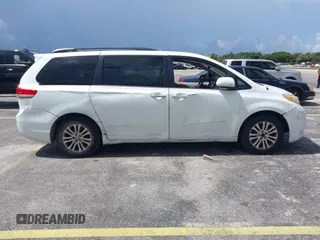 2014 Toyota Sienna XLE with VIN 5TDYK3DC4ES414728, listed as a IAAI auction lot 42588916 with 291,007 mi miles and . Bid and sale history available at DreamBid. Image 13.