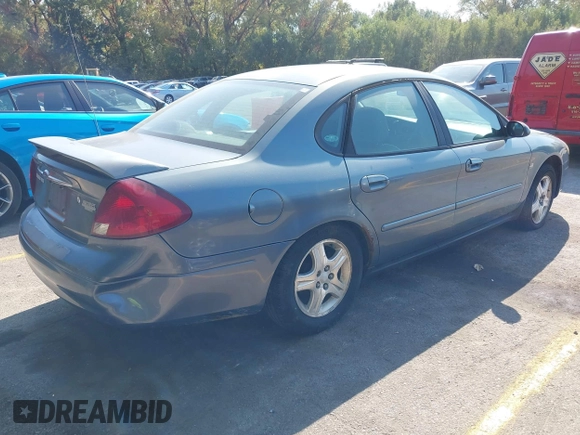 2001 Ford Taurus SEL with VIN 1FAHP56SX1G258514, listed as a IAAI auction lot 40548216 with 170,805 mi miles and . Bid and sale history available at DreamBid. Image 4.