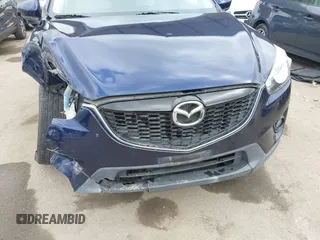 2014 Mazda CX-5 Grand Touring with VIN JM3KE2DY1E0307911, listed as a IAAI auction lot 42064898 with 133,934 mi miles. Bid and sale history available at carsss.com. Image 6.