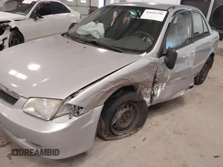 2000 Mazda Protege DX with VIN JM1BJ2226Y0206340, listed as a IAAI auction lot 41645396 with 238,500 mi miles and . Bid and sale history available at DreamBid. Image 6.