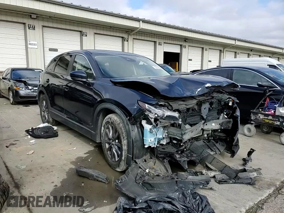 2019 Mazda CX-9 Sport с VIN JM3TCABY2K0321285, выставлен на аукционе Copart как лот 85372004 с пробегом 57 423 миль миль и Списание • Salvage title. История ставок и продаж доступна на DreamBid. Изображение 11.
