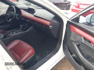 2021 Mazda 3 Premium with VIN JM1BPAML0M1302385, listed as a IAAI auction lot 41397521 with 55,907 mi miles and . Bid and sale history available at DreamBid. Image 5.