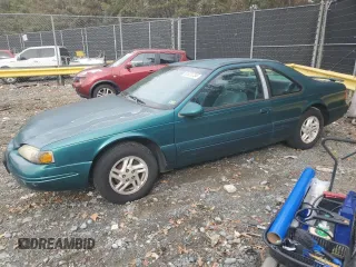 1997 Ford Thunderbird LX with VIN 1FALP6245VH171563, listed as a Copart auction lot 81970734 with 67,304 mi miles and Clean Title. Bid and sale history available at DreamBid. Image 1.