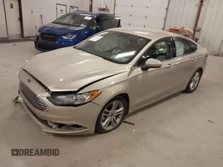2018 Ford Fusion SE z VIN 3FA6P0HD2JR201693, wystawiony jako IAAI lot #42012709 z przebiegiem 110 857 mil mil oraz . Historia ofert i sprzedaży dostępna na DreamBid. Obrazek 17.