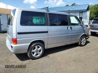 2003 Volkswagen EuroVan MV с VIN WV2MB47023H044047, выставлен на аукционе Copart как лот 71014624 с пробегом 189 485 миль миль и Чистый • Clean title. История ставок и продаж доступна на DreamBid. Изображение 3.