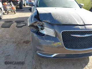 2016 Chrysler 300 Anniversary Edition with VIN 2C3CCAAG0GH206645, listed as a IAAI auction lot 41739990 with 154,516 mi miles and . Bid and sale history available at DreamBid. Image 6.