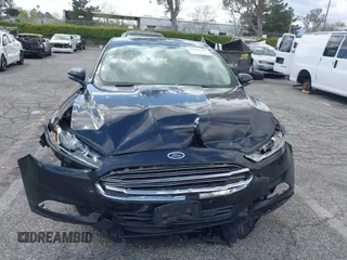 2015 Ford Fusion SE Hybrid with VIN 3FA6P0LU7FR199065, listed as a IAAI auction lot 41944181 with 197,020 mi miles. Bid and sale history available at carsss.com. Image 12.
