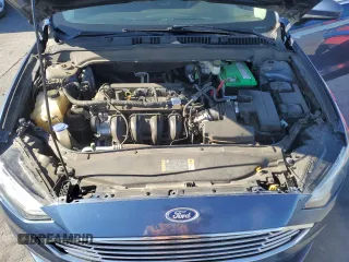 2018 Ford Fusion SE z VIN 3FA6P0H7XJR110391, wystawiony jako Copart lot #58069735 z przebiegiem 168 222 mil mil oraz Szkoda całkowita • Salvage title. Historia ofert i sprzedaży dostępna na DreamBid. Obrazek 11.