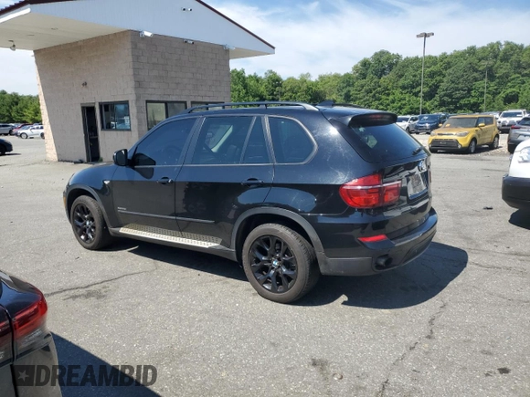 2012 BMW X5 35i with VIN 5UXZV4C54CL752079, listed as a Copart auction lot 62147515 with 147,244 mi miles and Clean title. Bid and sale history available at DreamBid. Image 2.