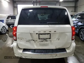 2014 Dodge Grand Caravan SE with VIN 2C4RDGBG6ER230346, listed as a Copart auction lot 50982295 with 173,576 mi miles and Salvage Title. Bid and sale history available at DreamBid. Image 6.