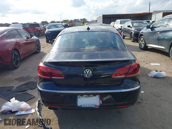 2013 Volkswagen CC Sport z VIN WVWBP7AN3DE570204, wystawiony jako IAAI lot #41478044 z przebiegiem 168 376 mil mil oraz . Historia ofert i sprzedaży dostępna na DreamBid. Obrazek 16.