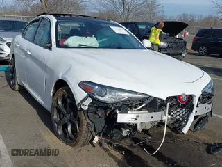 2019 Alfa Romeo Giulia Ti z VIN ZARFANBN0K7612860, wystawiony jako IAAI lot #41662433 z przebiegiem 57 064 mil mil oraz . Historia ofert i sprzedaży dostępna na DreamBid. Obrazek 1.
