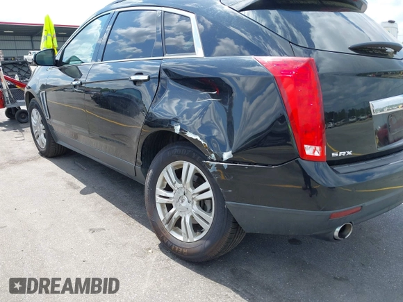 2014 Cadillac SRX with VIN 3GYFNAE30ES641616, listed as a IAAI auction lot 42000120 with 145,000 mi miles and . Bid and sale history available at DreamBid. Image 12.