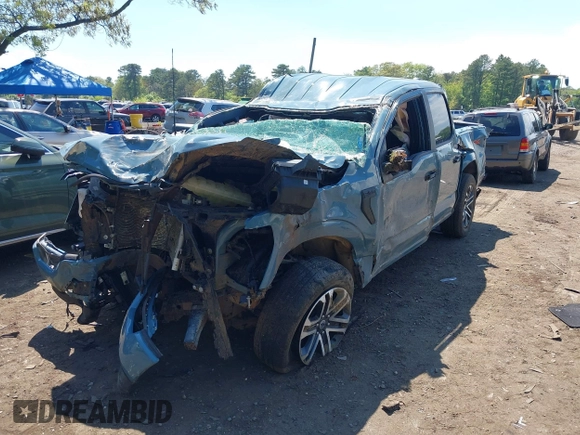 2023 Ford F-150 XL with VIN 1FTFW1E53PKD99214, listed as a IAAI auction lot 42211755 with 31 mi miles and . Bid and sale history available at DreamBid. Image 17.
