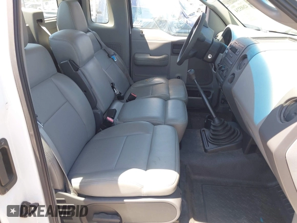 2007 Ford F-150 XL with VIN 1FTRF122X7KD26087, listed as a IAAI auction lot 42685234 with 136,061 mi miles and . Bid and sale history available at DreamBid. Image 5.