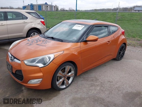2013 Hyundai Veloster RE:MIX with VIN KMHTC6AD5DU106088, listed as a IAAI auction lot 41904678 with 213,478 mi miles and . Bid and sale history available at DreamBid. Image 2.