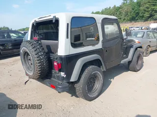 2000 Jeep Wrangler SE with VIN 1J4FA29P6YP791344, listed as a IAAI auction lot 42427688 with 184,549 mi miles and . Bid and sale history available at DreamBid. Image 4.