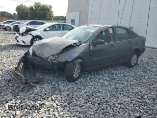 2006 Ford Focus S z VIN 1FAFP34NX6W252895, wystawiony jako Copart lot #59569435 z przebiegiem 112 232 mil mil oraz Szkoda całkowita • Salvage title. Historia ofert i sprzedaży dostępna na DreamBid. Obrazek 1.