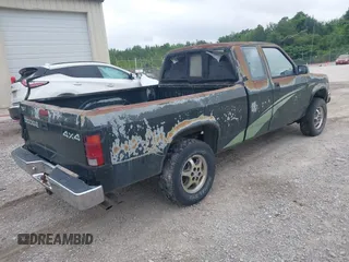 1996 Dodge Dakota z VIN 1B7GG23X1TS548256, wystawiony jako IAAI lot #42488533 z przebiegiem 180 688 mil mil oraz . Historia ofert i sprzedaży dostępna na DreamBid. Obrazek 4.