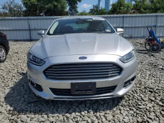 2013 Ford Fusion SE Hybrid with VIN 3FA6P0LU9DR217546, listed as a Copart auction lot 66597775 with Not provided miles and Clean title. Bid and sale history available at DreamBid. Image 5.