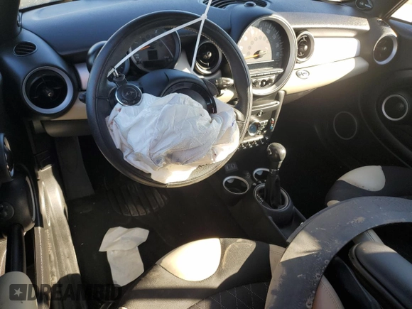2015 MINI Convertible with VIN WMWZN3C53FT862148, listed as a Copart auction lot 76911714 with 56,065 mi miles and Salvage title. Bid and sale history available at DreamBid. Image 8.