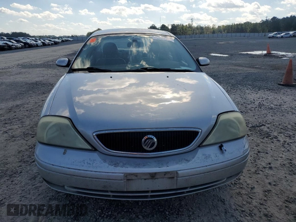 2003 Mercury Sable LS with VIN 1MEHM55S73A619013, listed as a Copart auction lot 73504154 with 200,135 mi miles and Salvage Title. Bid and sale history available at DreamBid. Image 5.