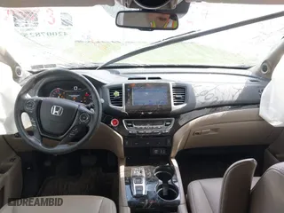 2016 Honda Pilot Touring with VIN 5FNYF6H90GB102403, listed as a IAAI auction lot 42007825 with 69,450 mi miles. Bid and sale history available at carsss.com. Image 5.