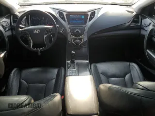 2013 Hyundai Azera с VIN KMHFH4JG2DA266282, выставлен на аукционе Copart как лот 59156175 с пробегом 135 013 миль миль и Списание • Salvage title. История ставок и продаж доступна на DreamBid. Изображение 8.