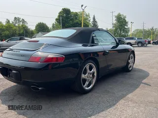 1999 Porsche 911 z VIN WP0CA2990XS651134, wystawiony jako Copart lot #59694365 z przebiegiem 80 805 mil mil oraz Czysty tytuł • Clean title. Historia ofert i sprzedaży dostępna na DreamBid. Obrazek 4.