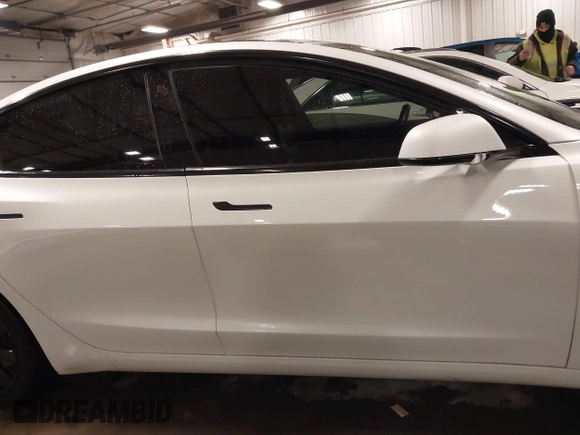 2018 Tesla Model 3 Long Range Battery with VIN 5YJ3E1EA8JF154738, listed as a IAAI auction lot 41013807 with 115,488 mi miles and . Bid and sale history available at DreamBid. Image 14.