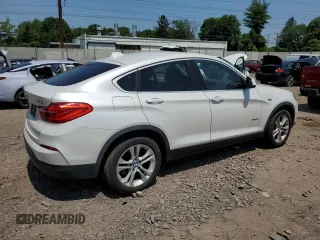 2015 BMW X4 xDrive28i with VIN 5UXXW3C56F0M87279, listed as a Copart auction lot 60426535 with 130,272 mi miles and Clean title. Bid and sale history available at DreamBid. Image 3.