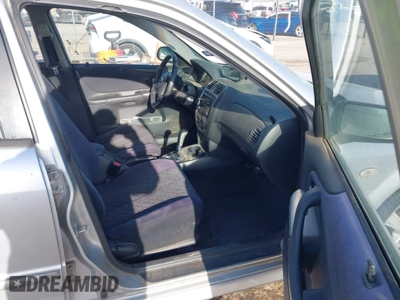 2003 Mazda Protege with VIN JM1BJ245131122498, listed as a IAAI auction lot 41990488 with 170,880 mi miles and . Bid and sale history available at DreamBid. Image 5.